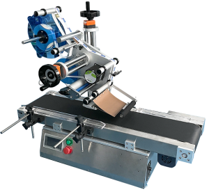 T160LB top labeler with a flat product on the conveyor under the label head